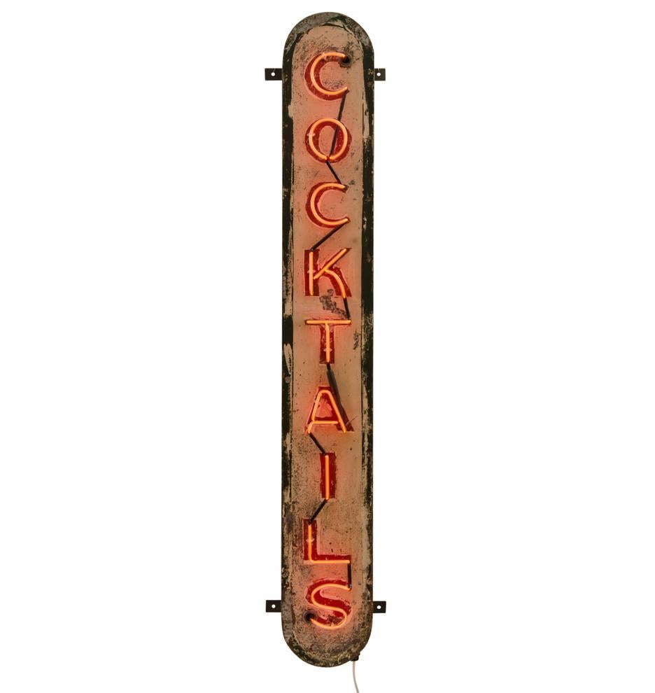 When the plug goes in, the party comes on and this bright red neon lets everyone know that it’s 5 o'clock somewhere. This vertical sign would have protruded from the corner of a bar in its hay-day. Today, the original paint could only be salvaged