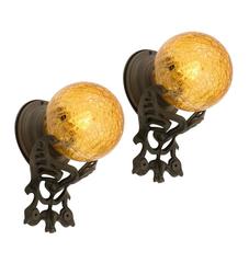Vintage Pair of Cast Iron Entry Sconces with Amber Glass Globes, circa 1935