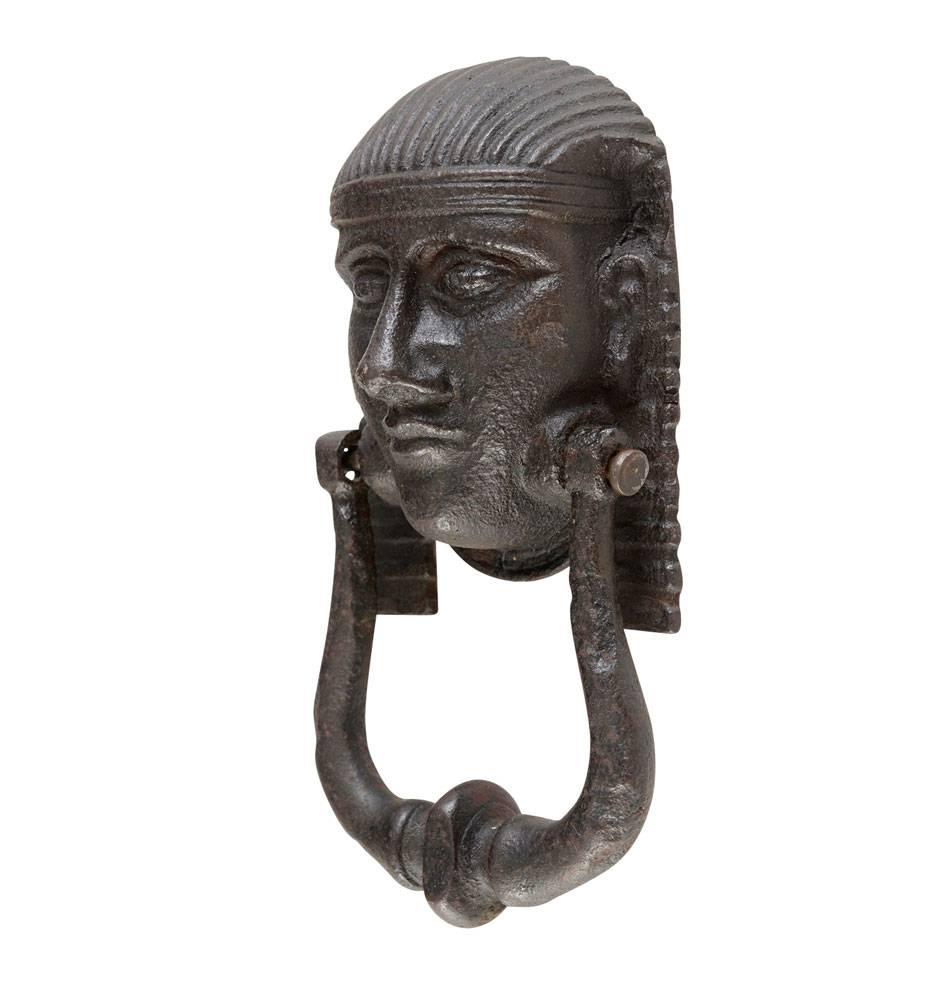 Beautifully cast in iron, this impressive knocker will bring the Egyptian Revival right to your door. With resounding power, the weighty strike would echo through your home, alerting everyone inside and out that history is knocking.

Notes: If