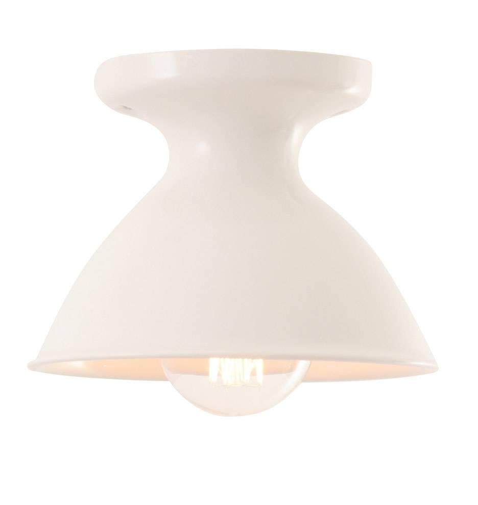 The Pass & Seymour Inc. line of Alabax lighting promised a fixture that would not tarnish, rust or stain because it was made entirely of porcelain. These stark and utilitarian flush mount fixtures have a wonderful modern shape that, finished