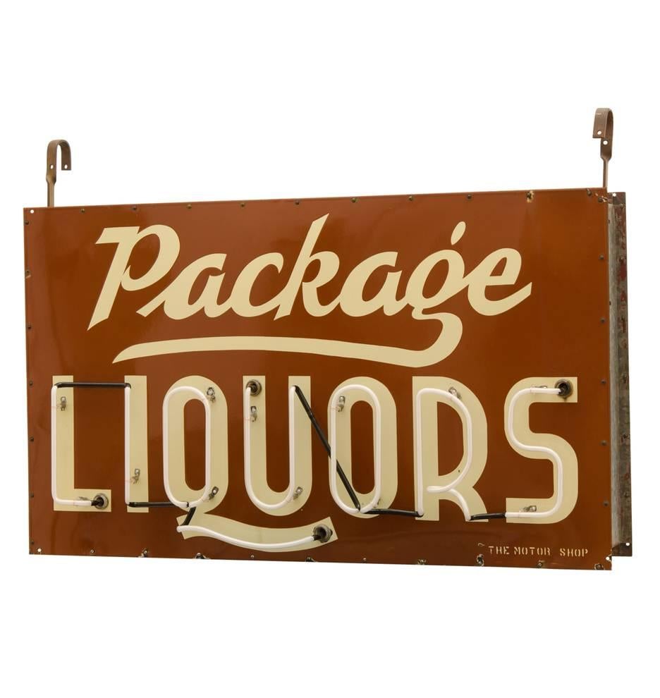 Once in a blue moon we come across a neon sign with porcelain enamel face plates and we get very excited. This holy grail of vintage signs proudly advertises Package LIQUORs for the no-nonsense blue-collar joe, which (for those of us that are