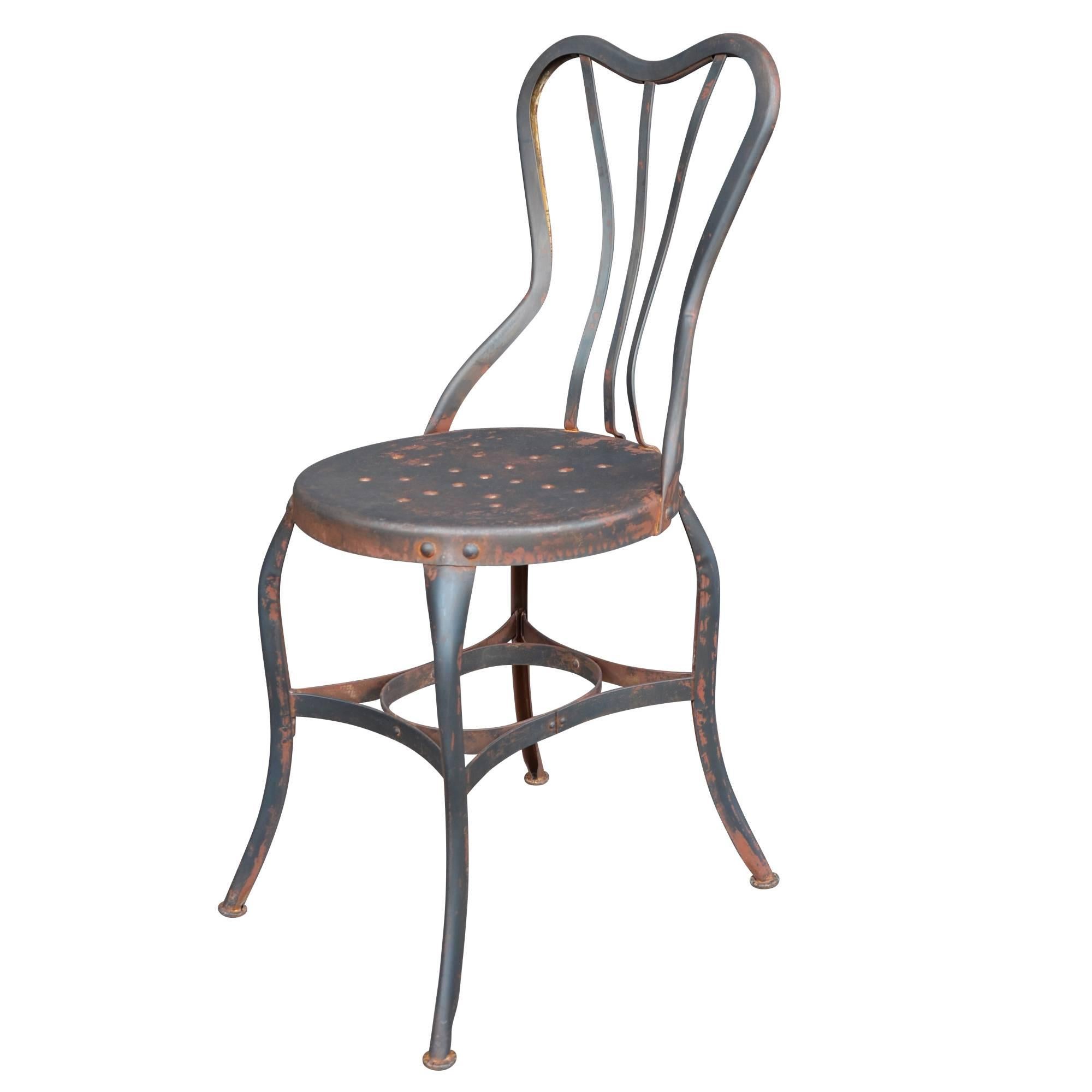 We are in love. This set of Toledo cafe chairs bring absolutely everything to the table: the historic importance of the Toledo-based Uhl Art Metal Furniture Company, an incredible raw steel finish, which is perfectly worn from a lifetime in the