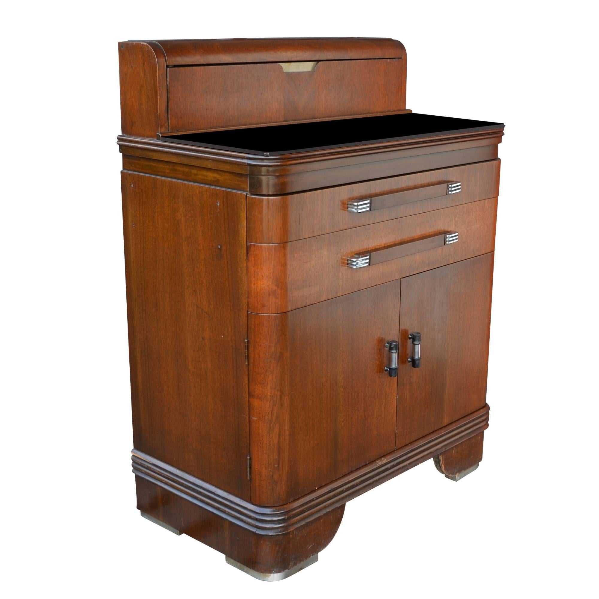 Made by the Hamilton Cabinet Company, this smart little dental cabinet has lots of great features: a handy work surface, eight drawers for storage and rolling casters. But function isn't everything with this cabinet, it also brings dapper Streamline