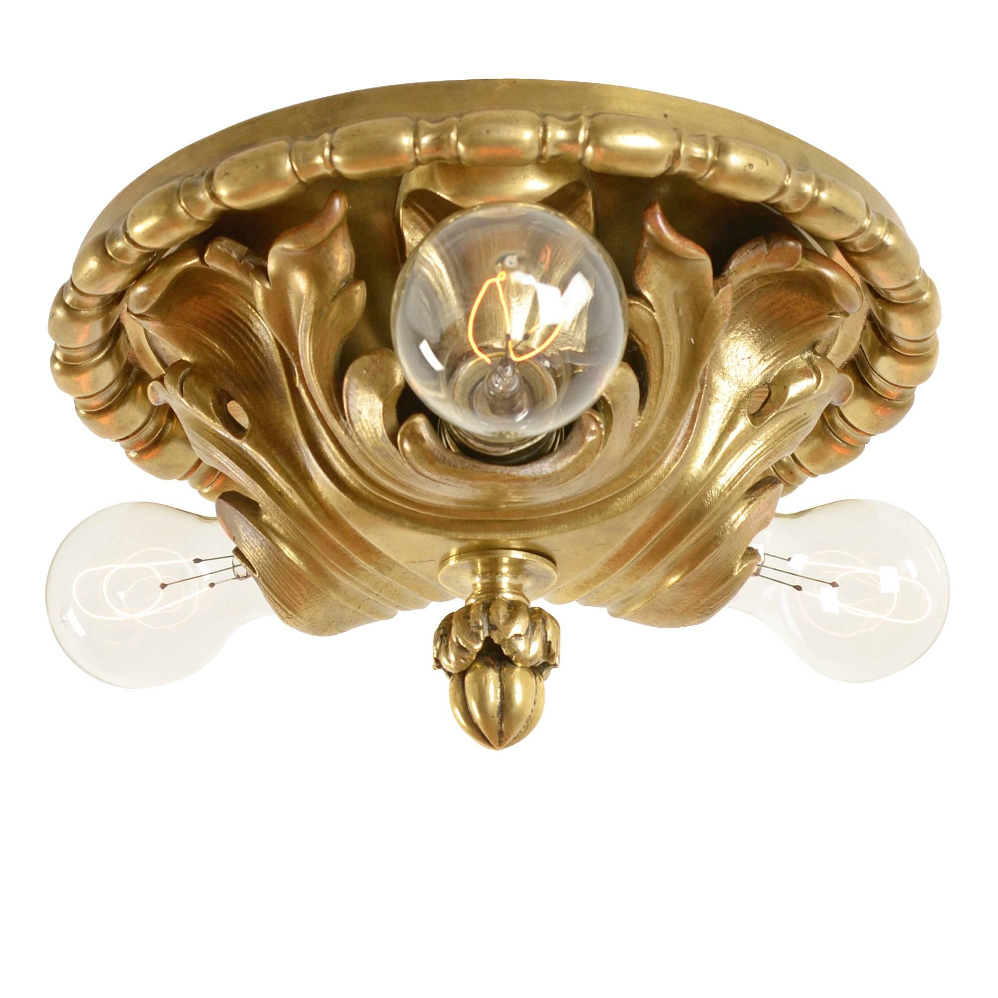 Exposed bulbs were widely popular lighting choices during the 1910s and 1920s and so was a free exploration of Classical Revival motifs. That style teamed for a high-end, yet traditional look, which was well-suited for the countless houses built