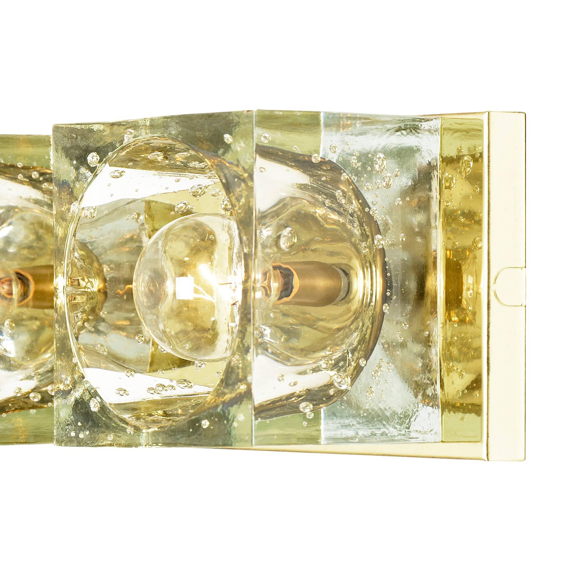 The 1976 Lightolier catalog calls this the Mirage sconce, and promises that it will provide a "fantasy of reflections." Conceived by one of Modernism's great designers, Gaetano Sciolari, Lightolier produced the Mirage sconce to have