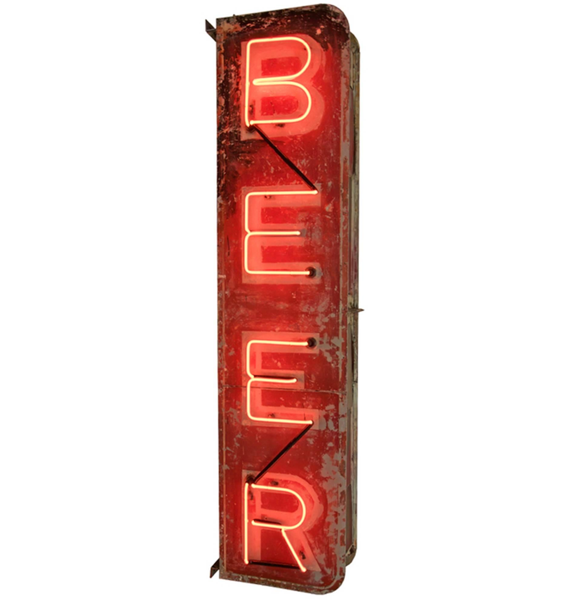 Worn and rusted, we love this reclaimed neon sign almost as much as what it's advertising. Perfect for a bar or restaurant (really, anywhere), this Mid-Century sign boasts a hand-painted red and white composition, with glowing red neon. While the