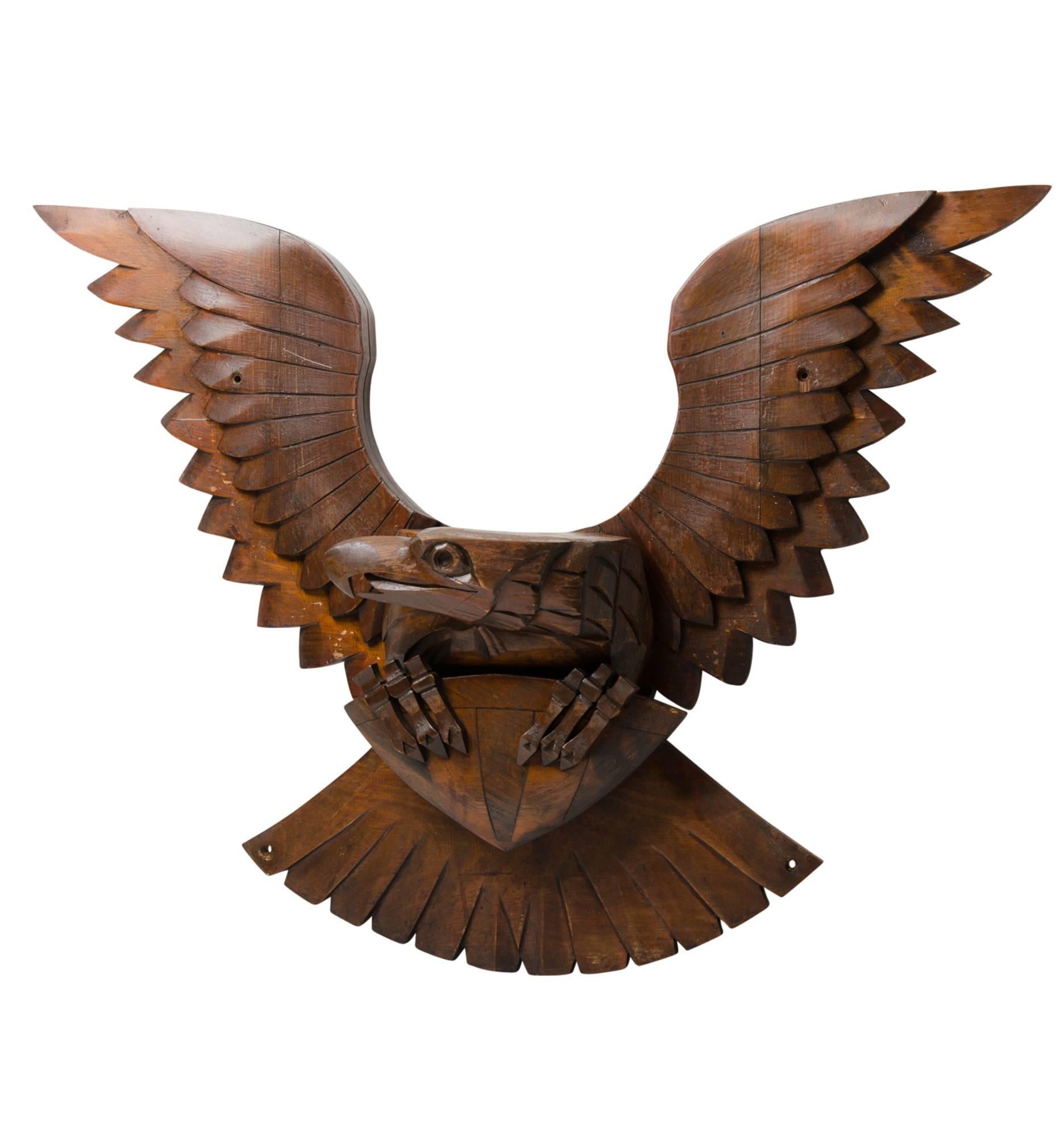 Majestic and proud, this large eagle crest spans 43 1/4