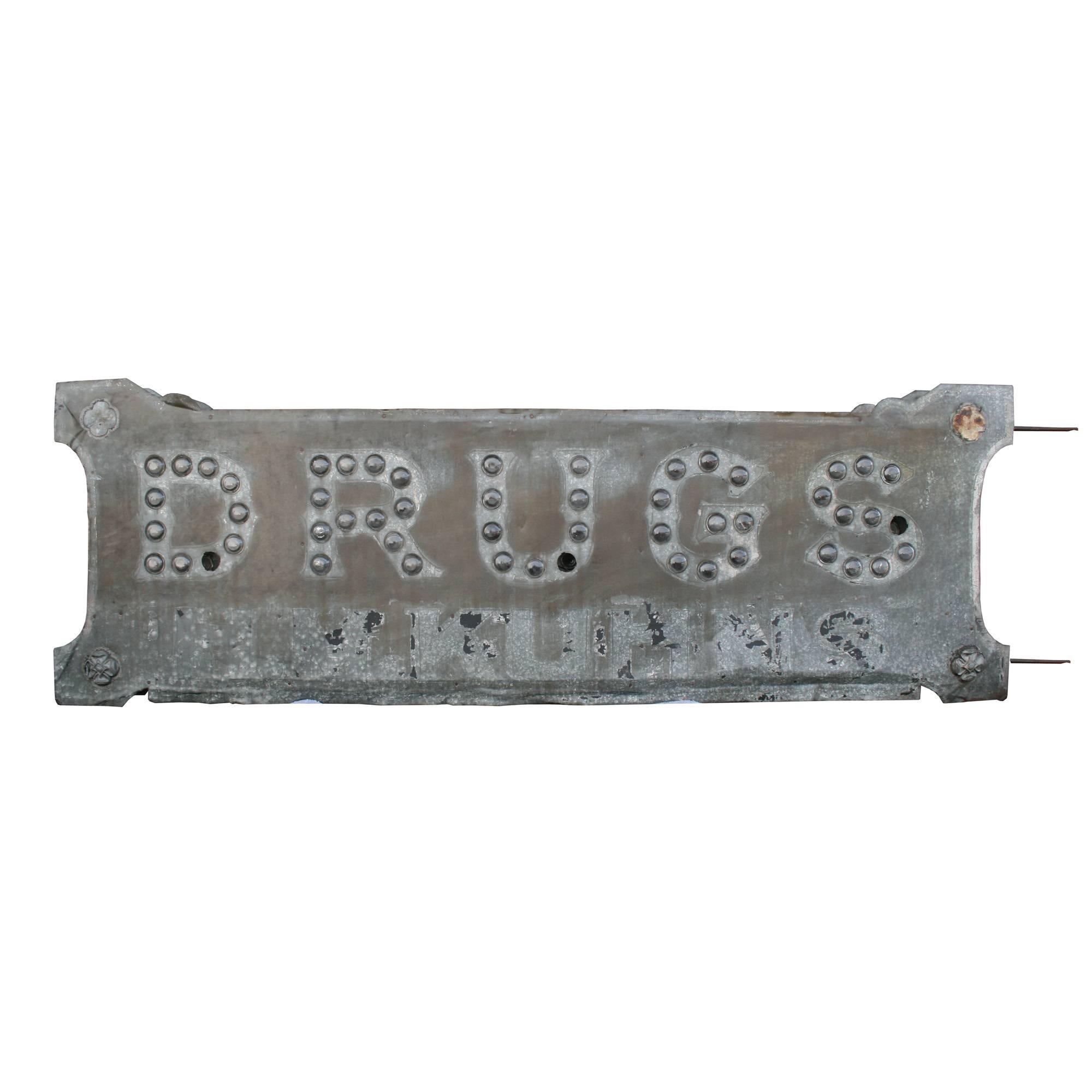 Made from sheets of beautifully patinaed zinc, this early-century drugs sign has so many stunning attributes: the 2