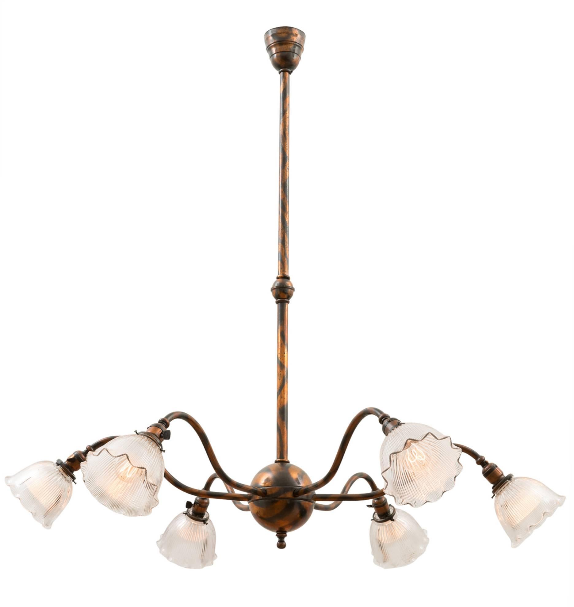 In the world of early electric commercial and Industrial lighting, this fixture is king. We are releasing this fixture from our archive, as it was used by Rejuvenation product designers to launch a line of early-century chandeliers and prismatic