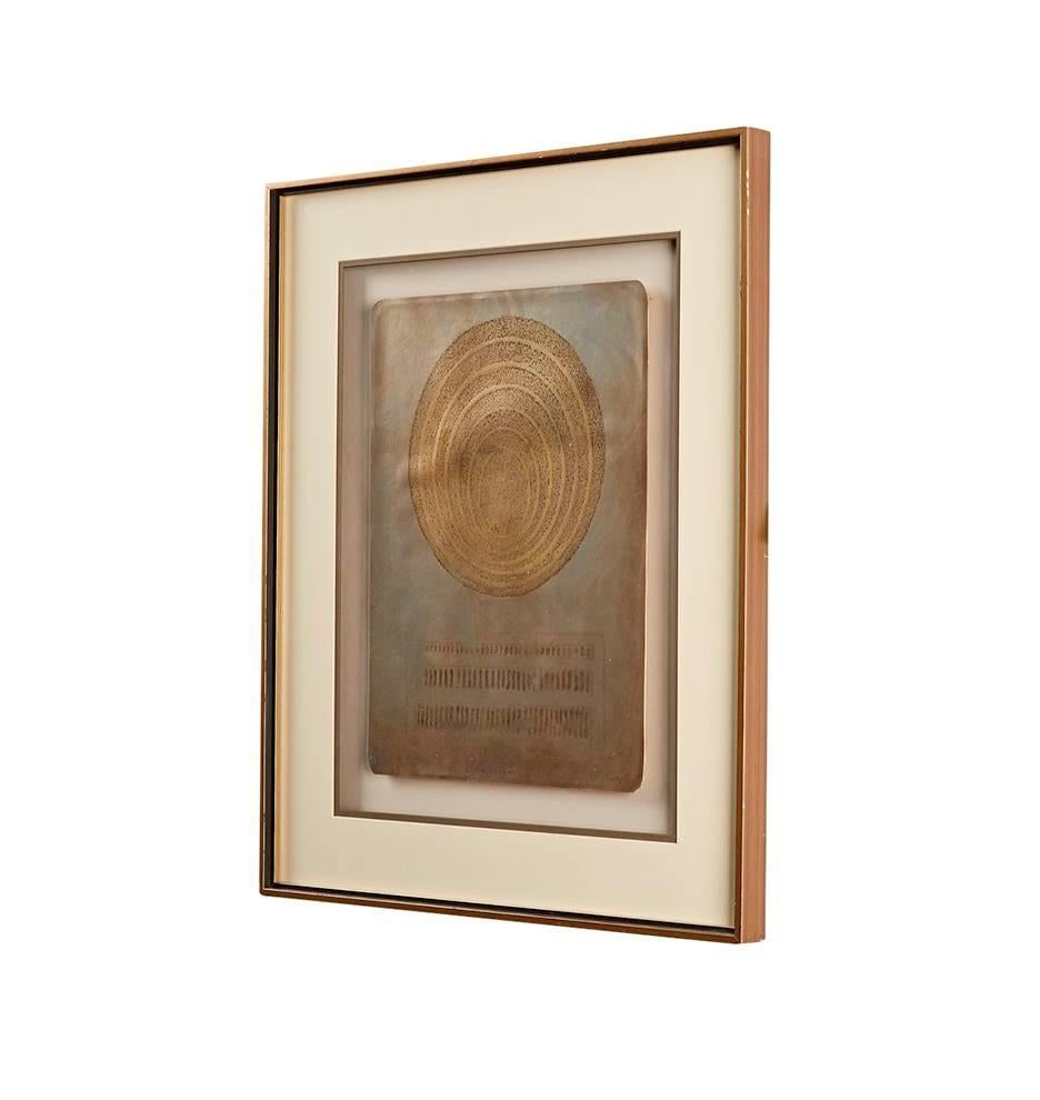 Harris strong was most-known for his work in ceramics. This engraved metal piece was from a series of lithographs he created base on concentric circles and tick-marks. Engraved then finished with silver leaf, this piece is still in its original