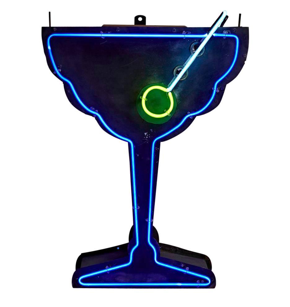 With this neon Martini Glass sign, it's 5 o'clock everywhere. Worn and rusted, we love this reclaimed neon sign almost as much as what it's advertising. Perfect for a bar or restaurant (really, anywhere), this mid-century sign boasts a hand-painted