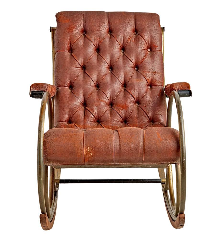 Modern rocking chairs that were both innovative and retrospective became trend in the 1960s and 1970s. This example by Lee Woodard & Co. is perhaps one of the most coveted results of that movement. Likely inspired by Michael Thonet or Josef