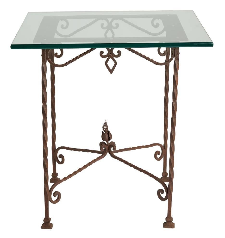 Comprising incredible wrought iron twist and tendril work, this gorgeous 19th century table base has been reborn for modern use with the addition of a 3/4