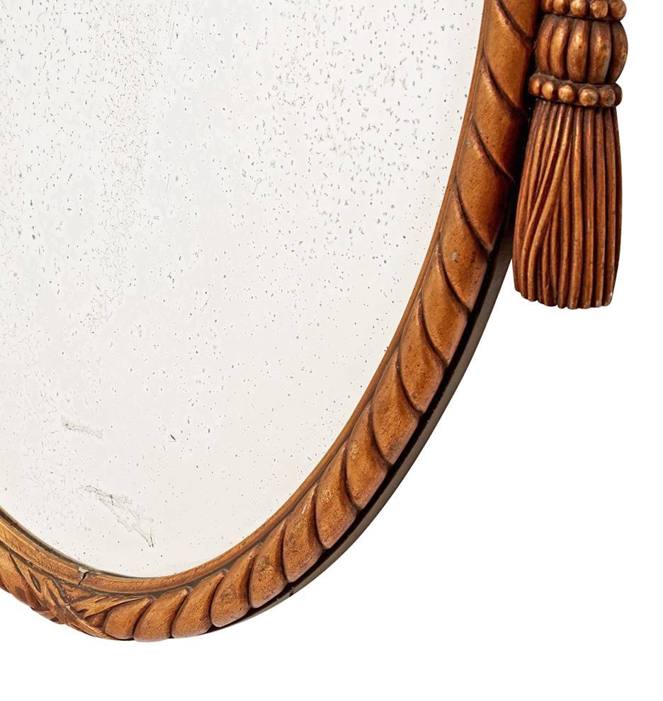Early 20th Century Revival-Style Carved French Mirror with Tassels, circa 1920s For Sale
