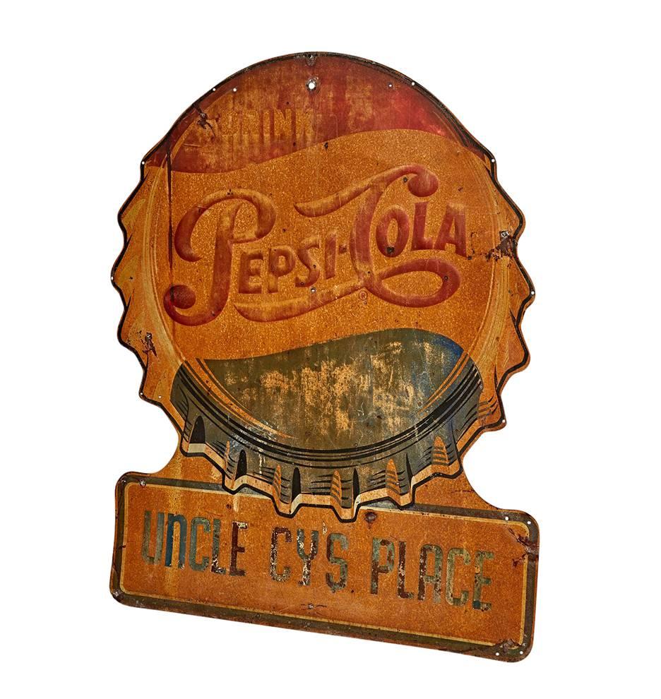Bottle cap signs are always great collector's items, but this edition is elevated by wonderful wear and the addition of a charming epigraph along the customizable plate: Uncle Cy's Place.