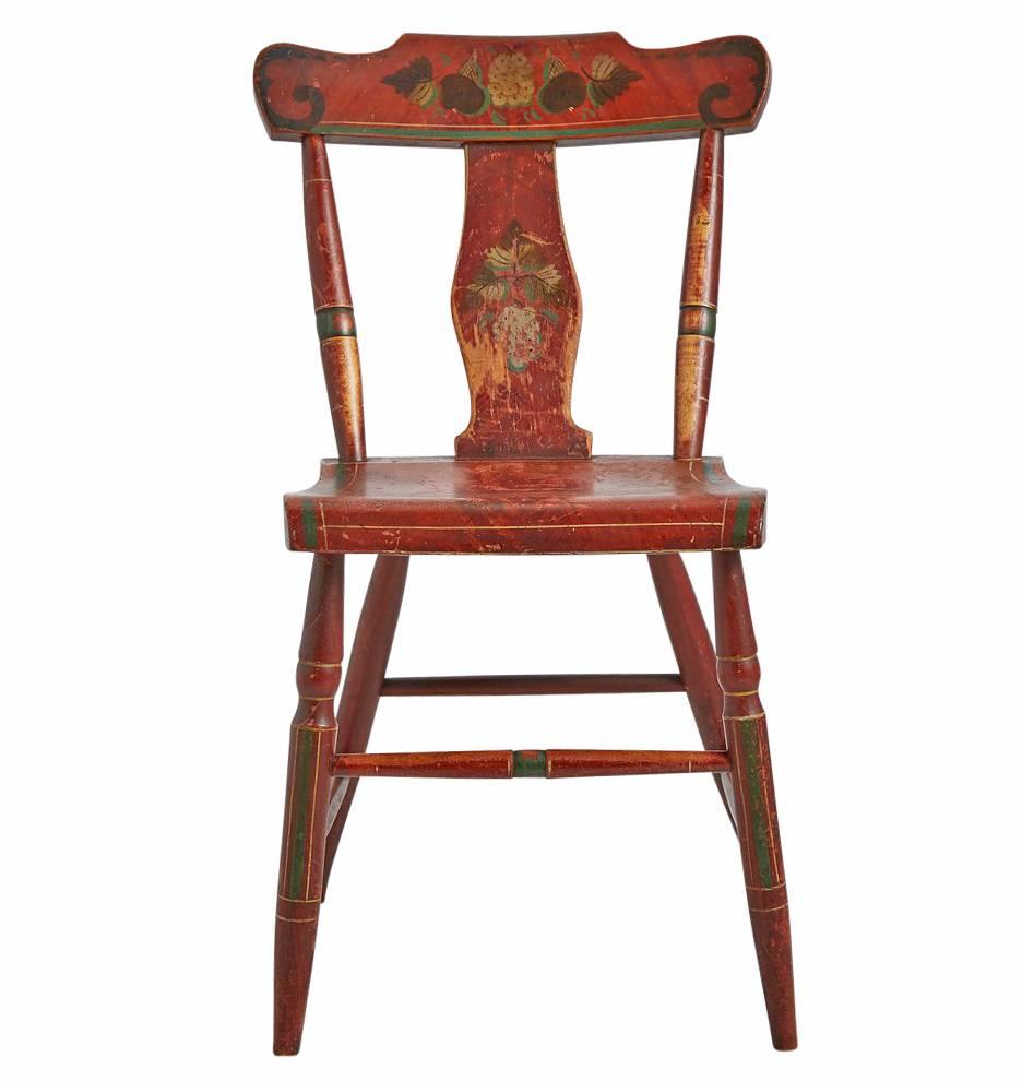 Beautiful set of four colorfully painted chairs from the mid-19th century, found on a recent trip through the Hindeloopen region of the Netherlands. They feature shaped crest rails over arrow backs, with nicely carved plank seats and lovely