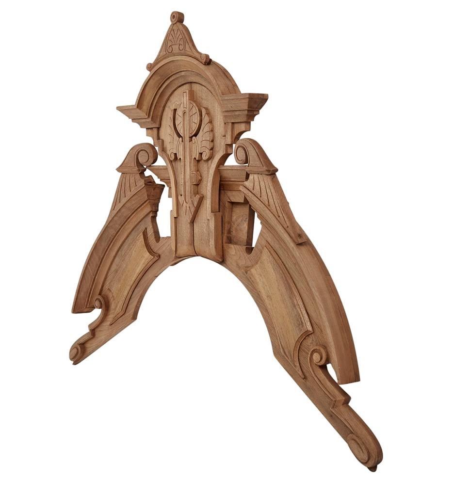 Over 100 years old, this beautifully carved walnut architectural remnant of the American Aesthetic Movement would have been found decorating the window of a 19th-century American municipal building or impressive manor. This piece would have capped a