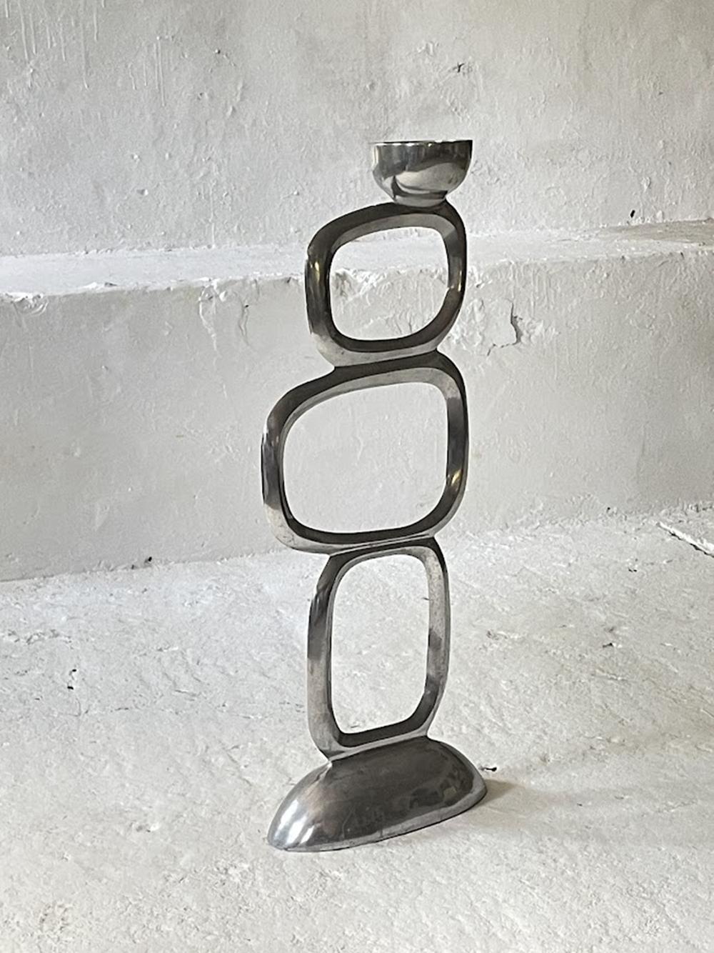 Vintage aluminum sculpture from the 1980s, Attributed to: Matthew Hilton.
This exceptional artwork stands out with its distinctive geometric shapes and elegant presence, making it a striking centerpiece for your home, office, or any design-focused