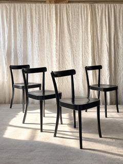 Lot de quatre chaises de salle à manger en bois « Moser 1-250 » noires, design de Werner Max Moser