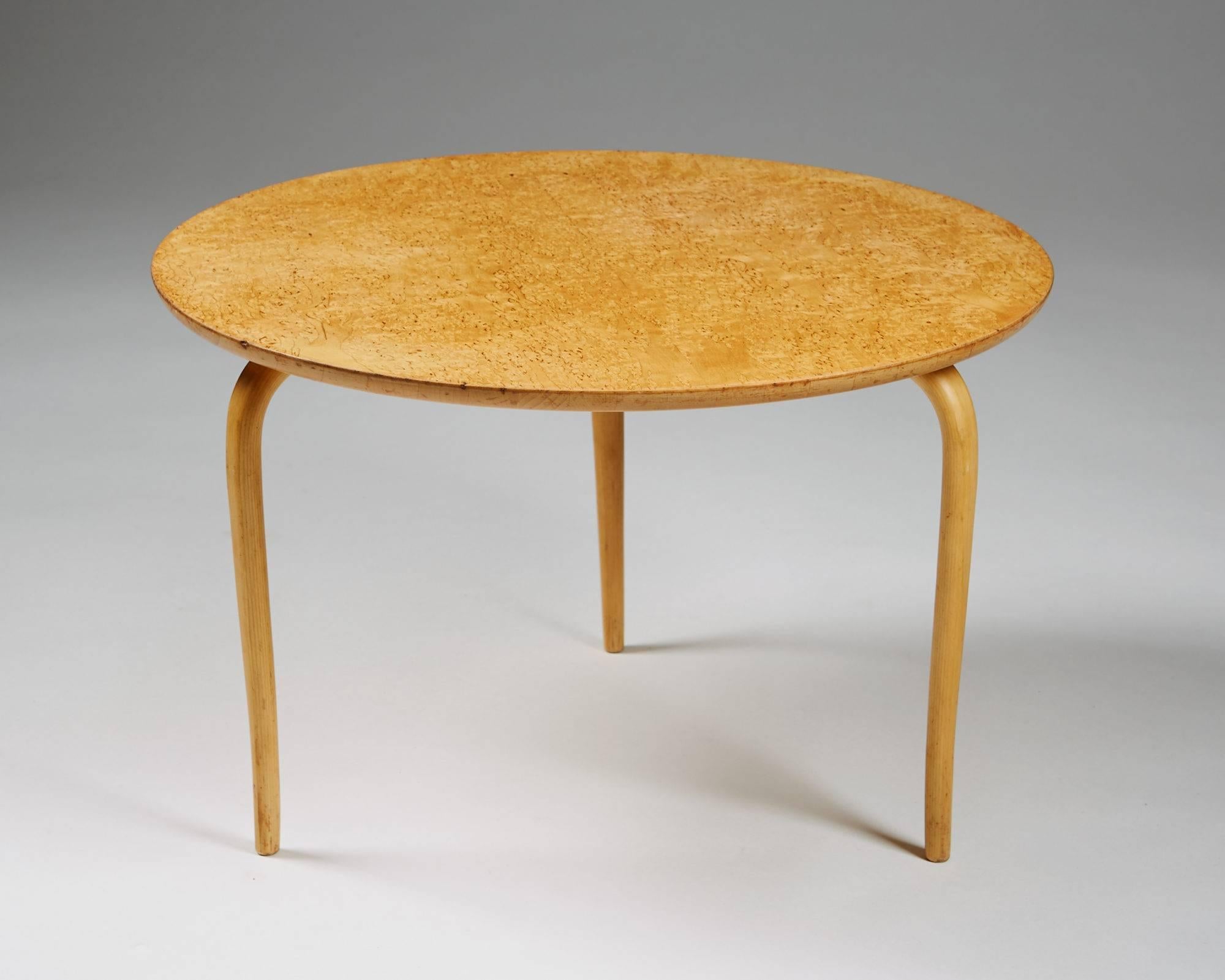 Occasional table designed by Bruno Mathsson for Karl Mathsson,
Sweden, 1950s.
Birch and Karelian birch.

Measures: H 35 cm/ 13 3/4