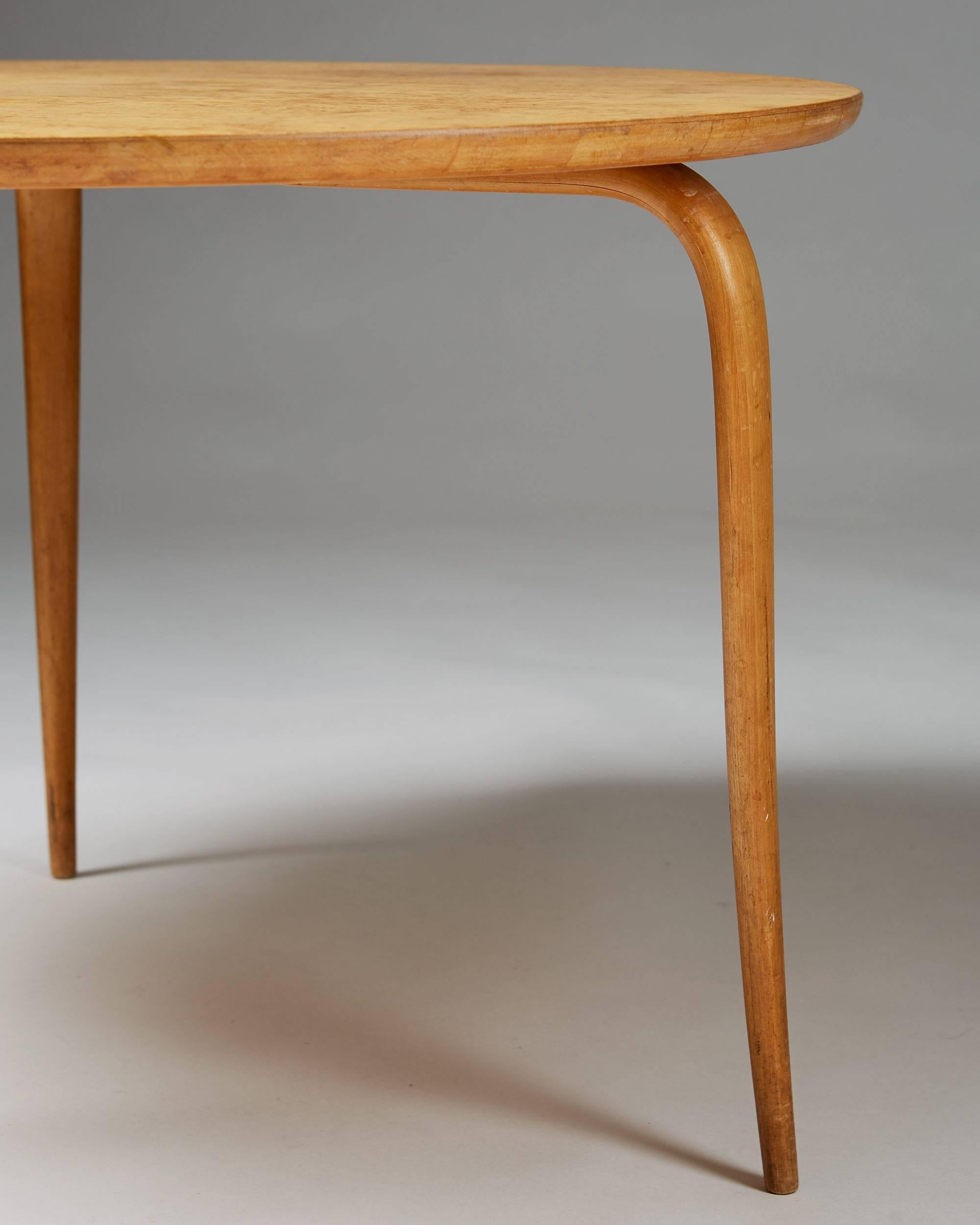 Occasional table Annika designed by Bruno Mathsson, Sweden, 1936.

Birch and Karelian birch.

Measures: H: 51 cm / 20''
D: 85 cm / 33 1/2''.