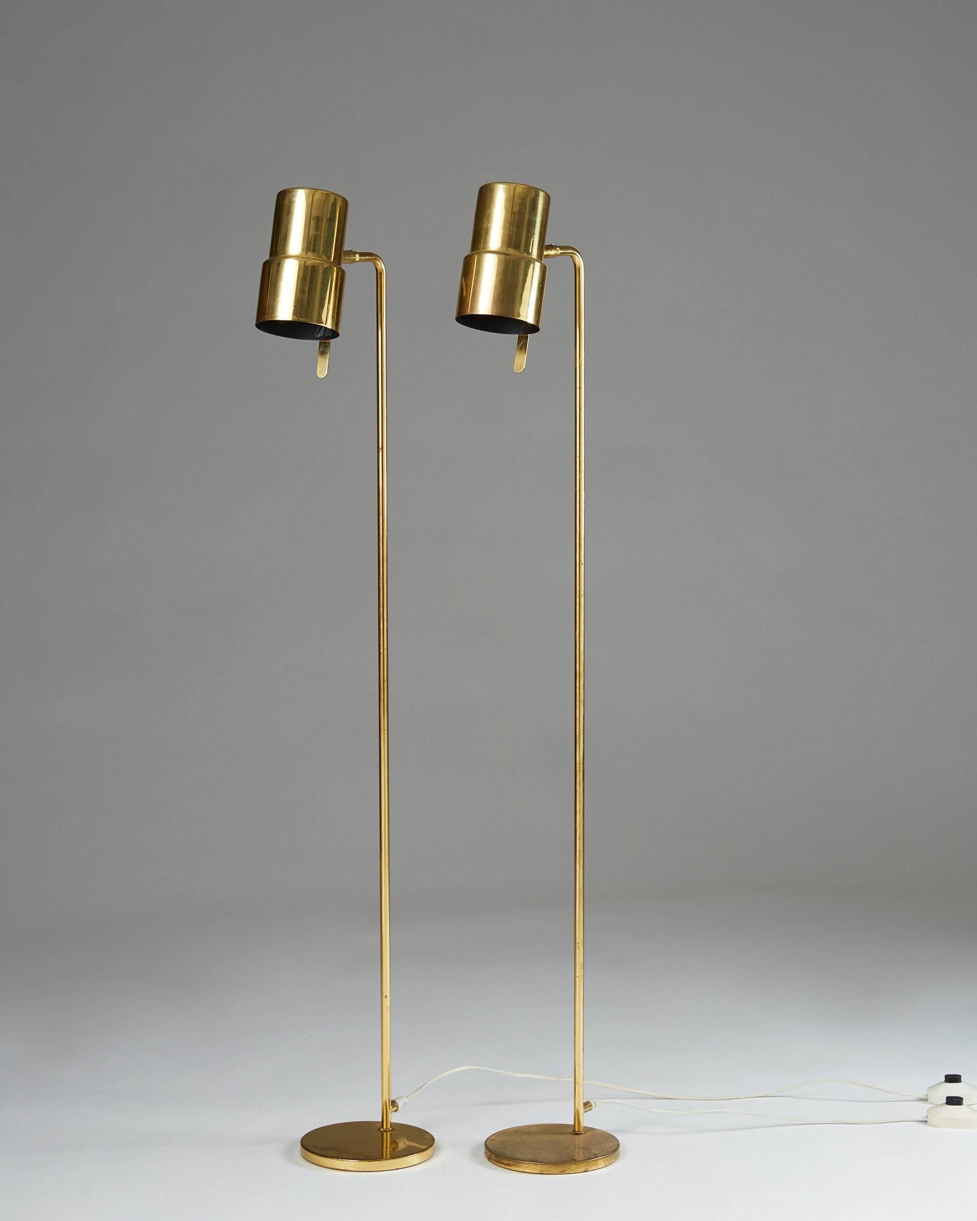 Pair of floor lamps designed by Hans-Agne Jakobsson, Sweden, 1960s. Polished brass.

Measure: H 116 cm/ 3' 9 1/2''.