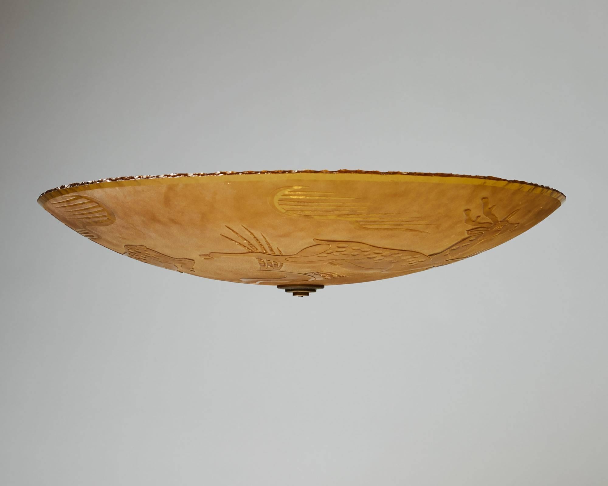 Ceiling lamp designed by Einar Forseth for Glössner, Sweden, 1940s. Etched glass and brass.

Measures: D 70 cm/ 27 1/2''
H 15 cm/ 6