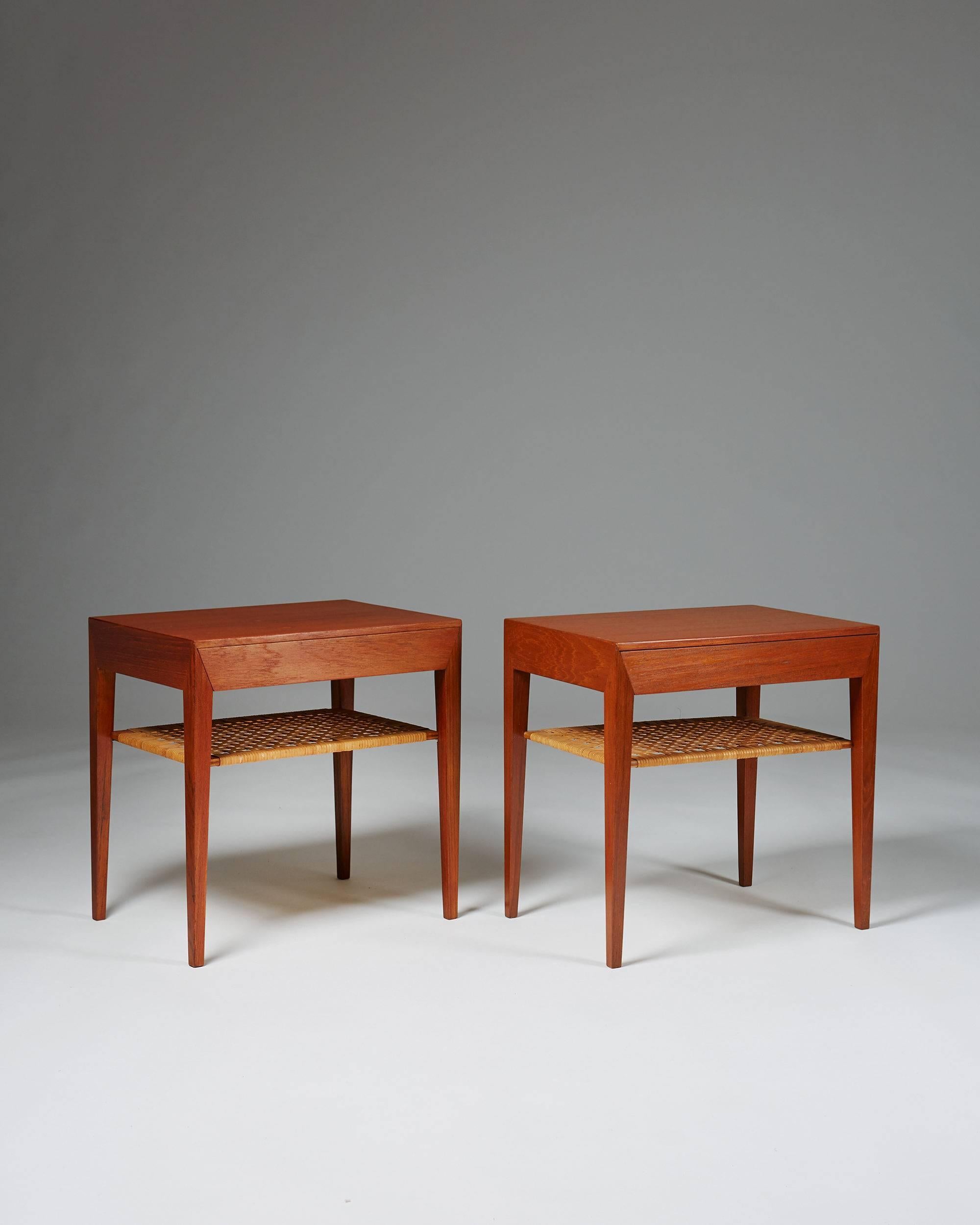 Pair of bedside tables designed by Severin Hansen for Haslev, Denmark, 1950s. Teak and cane.
Measures:
H 50 cm/ 19 3/4''
L 50 cm/ 19 3/4''
D 35 cm/ 13 3/4''.
 