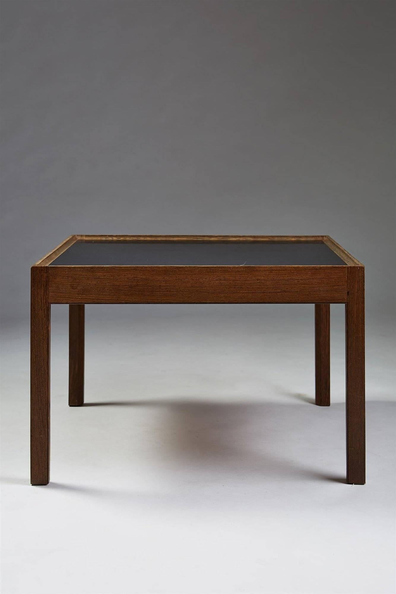 Occasional table designed by Erik Christian Sörensen for Bovirke, Denmark, 1960s. Wenge and black laminate.

Measures: H 45 cm/ 17 3/4