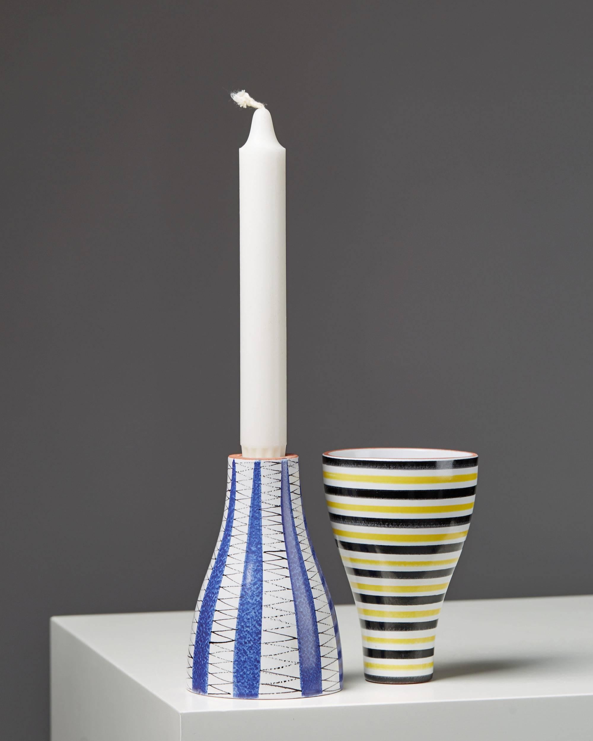 Pair of vases/ candlesticks designed by Stig Lindberg for Gustavsberg, Sweden, 1950s.

Measure: H 12 cm/ 4 3/4''.