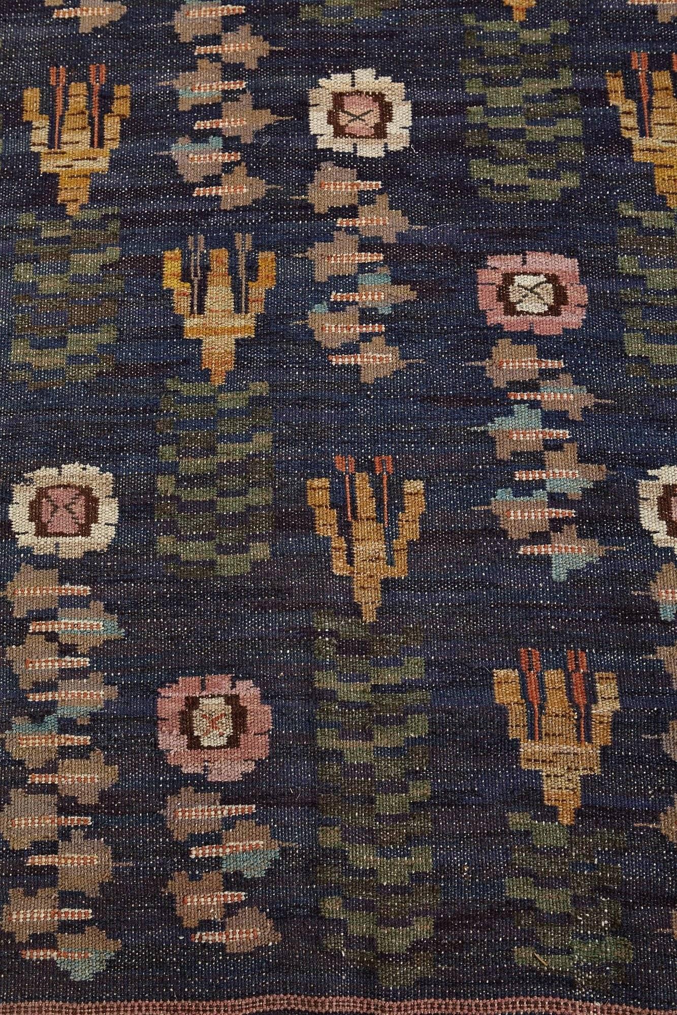 Rug, roses and lillies, designed by Marta Maas-Fjetterström, for MMF, Sweden. 1930s. Rug/tapestry. Very rare design. Pure wool. Tapestry technique.

Measures: L 255 cm/ 8' 4 1/2