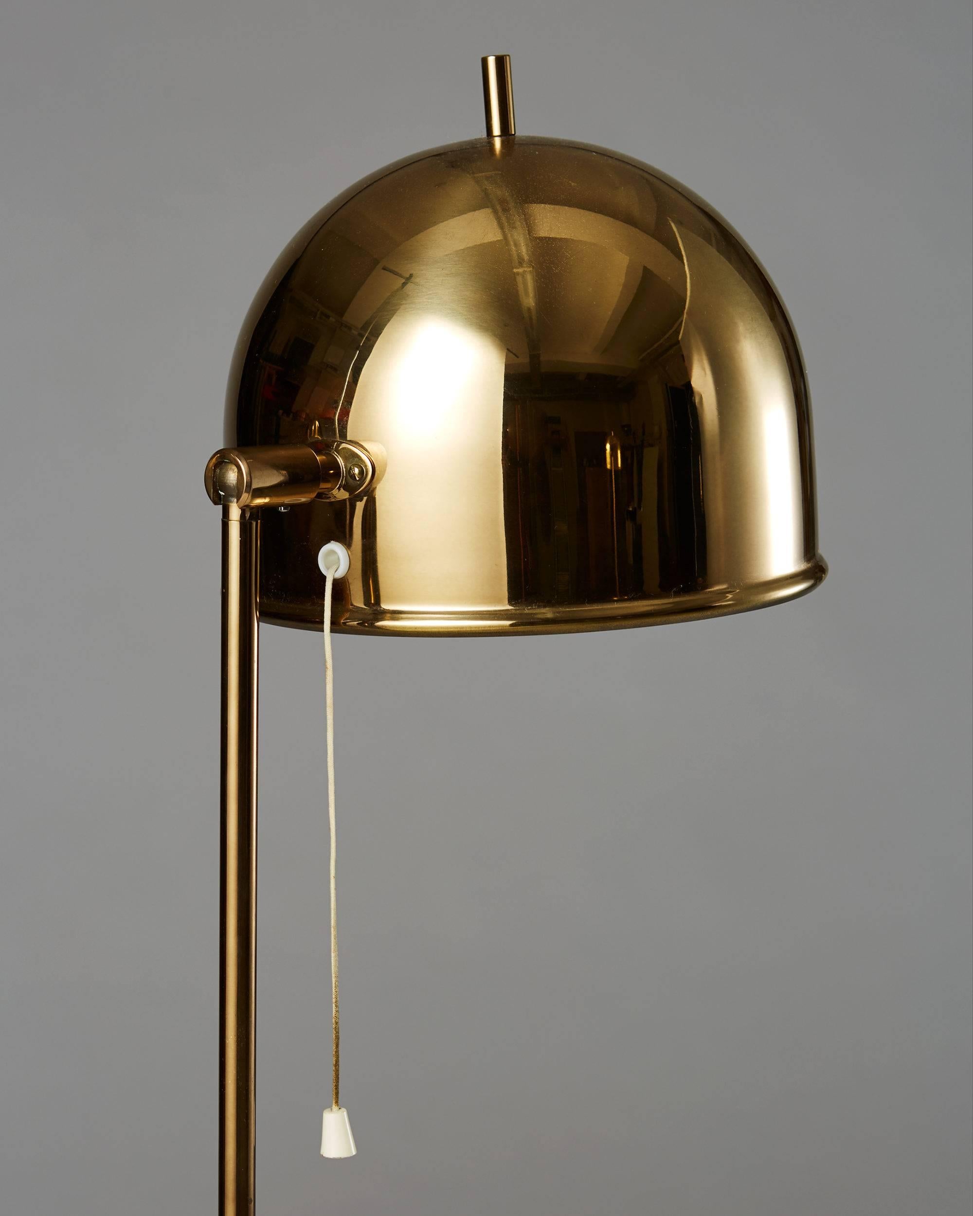 Pair of floor lamps, anonymous for Bergboms, Sweden,
1960s.

Brass.

Measure: H 137 cm/ 4' 6''.