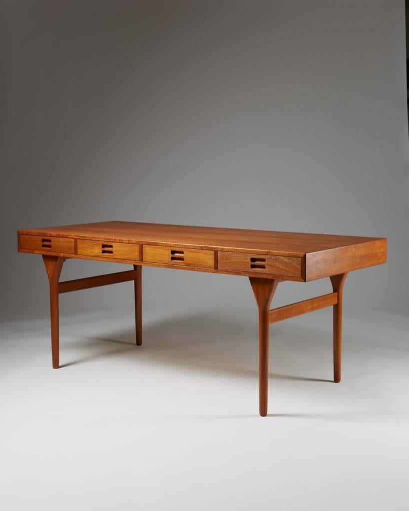 Desk designed by Nanna and Jörgen Ditzel for Sören Willadsen, 
Denmark, 1955.
Teak.

Measures: H 72 cm/ 28 1/2