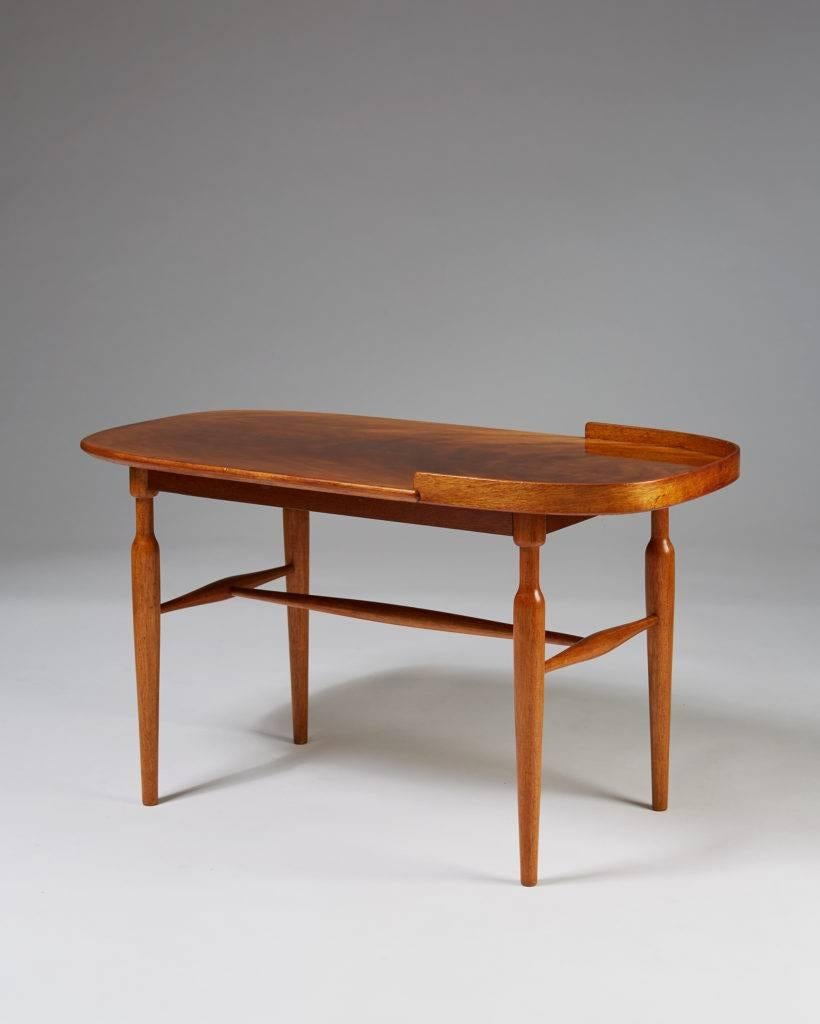 Occasional table model 961 designed by Josef Frank for Svenskt Tenn, 
Sweden, 1950s.

Mahogany.