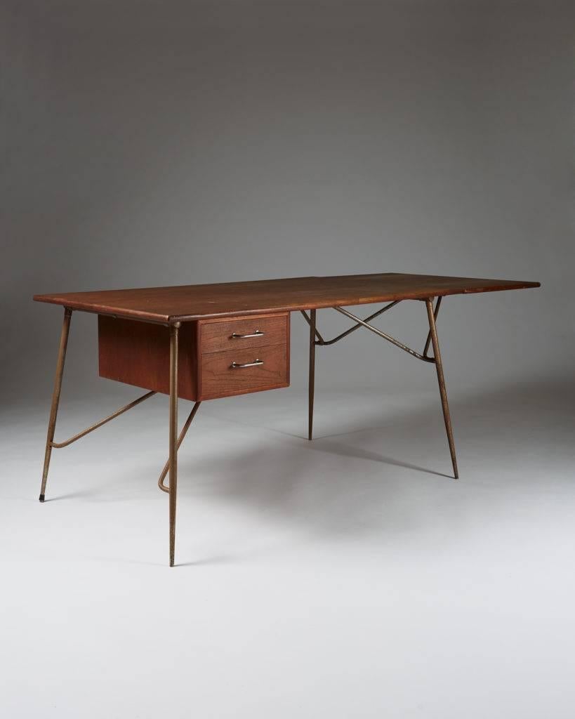 Desk designed by Börge Mogensen for Söborg,	
Denmark, 1952.

Teak and steel.
