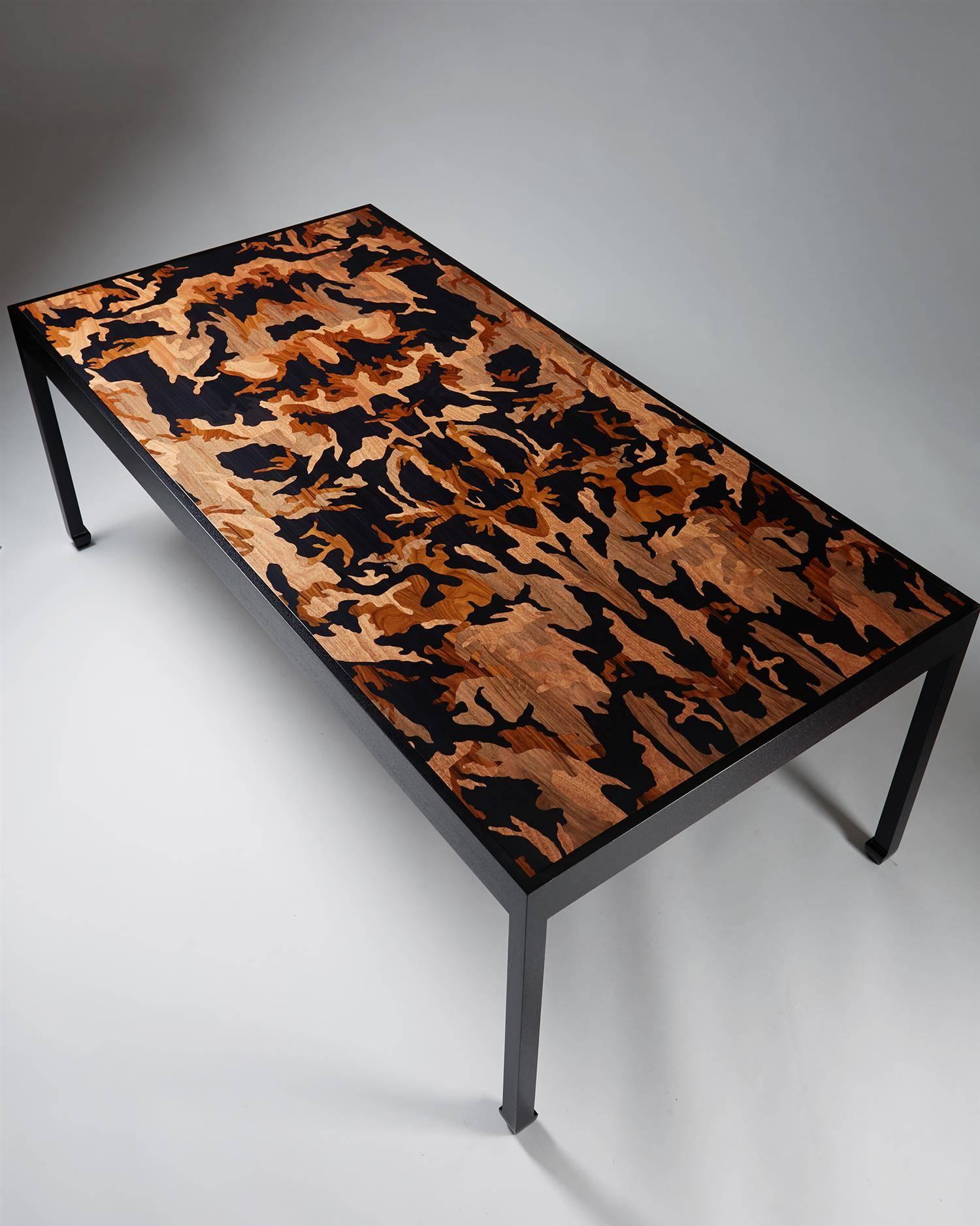 Dining table designed by Morten Höeg Larsen, Denmark. 2015.
Ebonized wood and various wood inlays.
Unique.

H: 72 cm/ 28 1/2''
L: 200 cm/ 6' 6 3/4''
W: 100 cm/ 39 1/2''