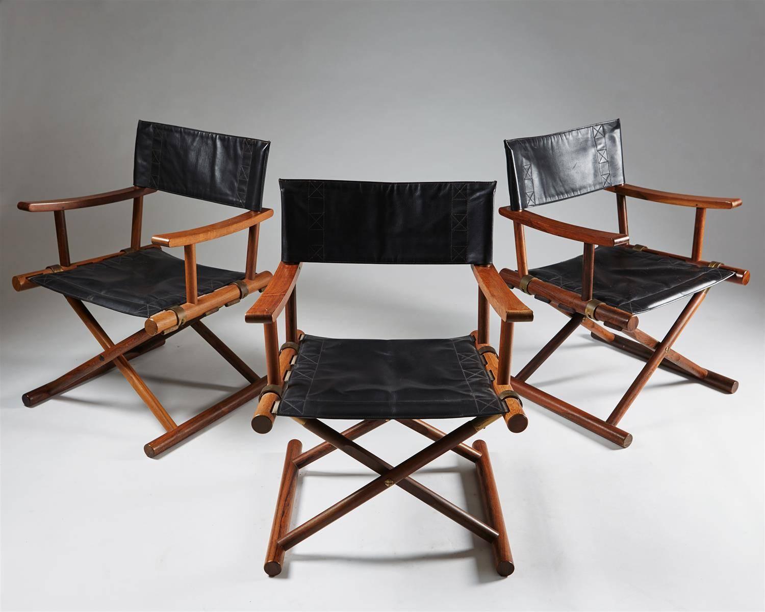 Armchairs designed by Sune Lindström for Nordiska Kompaniet, 
Sweden, 1960s.
Rosewood and leather.