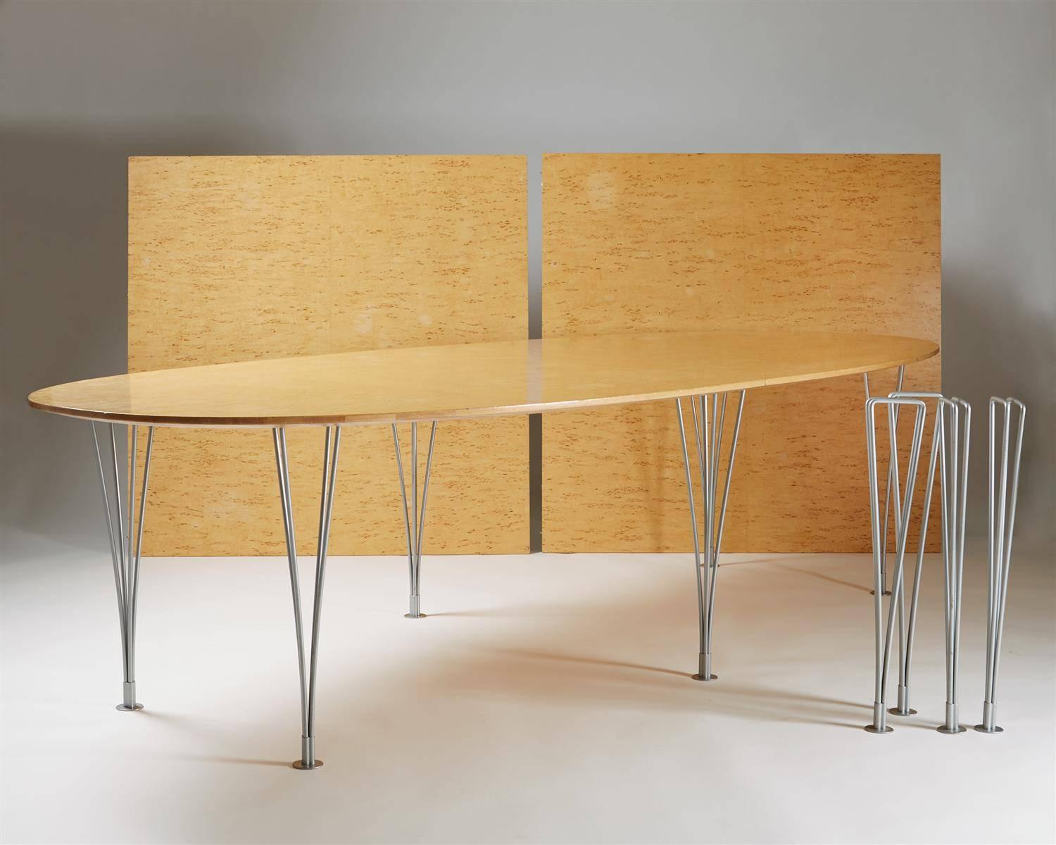 Large dining/conferance table designed by Bruno Mathsson for Mathsson International,	
Sweden. 1960's.

Karelian birch and chromed steel.
