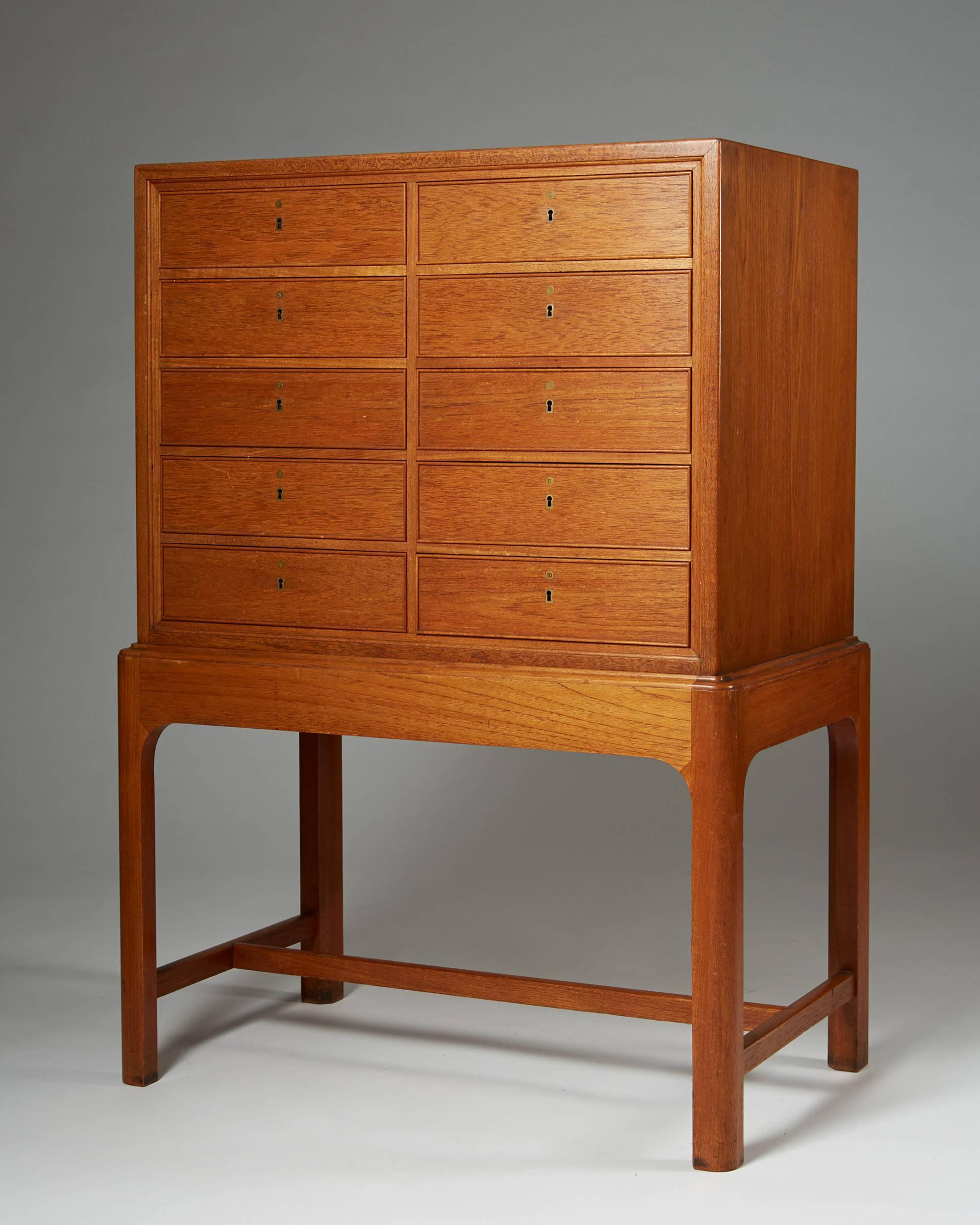 Cabinet designed by Kaare Klint for Rud Rasmussen, Denmark, 1930s.
Teak and brass.

