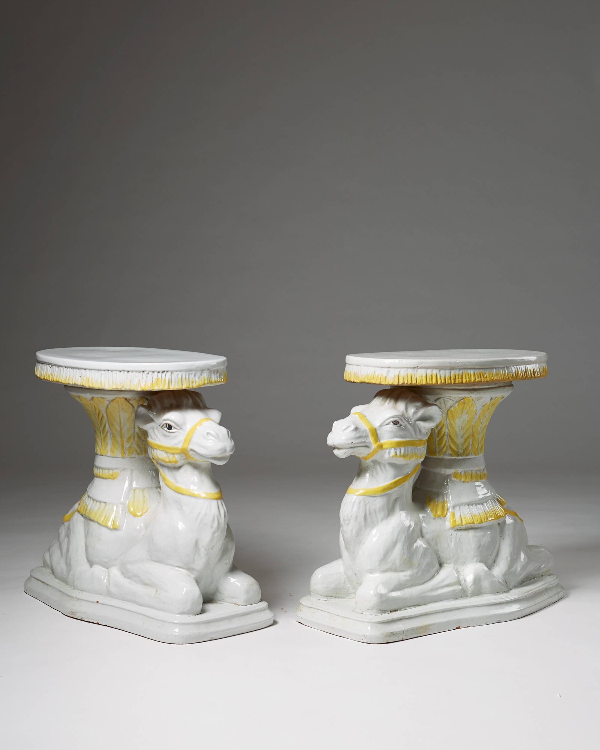 Pair of end tables anonymous Italy, retailed by Svenskt Tenn. Sweden, 1950s.
Handglazed terracota.

Measures: H: 57 cm/ 22 1/2''.
L: 65 cm/ 25 1/2''.
D: 33 cm/ 13''.

Sold as a pair.