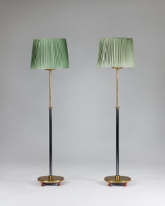 A pair of floor lamps 'Model 2564' designed by Josef Frank for Svenskt Tenn