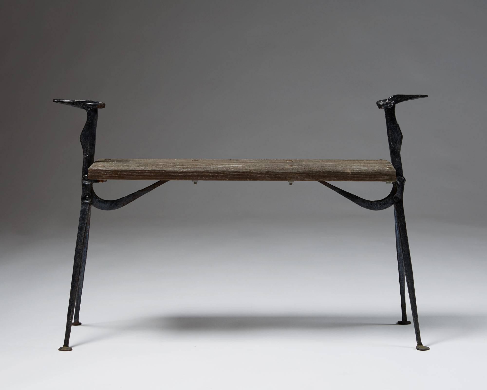Bench designed by Folke Mattsson, Sweden, 1980s.
Forged iron and solid wood.
Signed FM.

Measures: H: 62 cm/ 24 1/2''
L: 94 cm/ 37''
SH: 44 cm/ 17 1/4''.
  