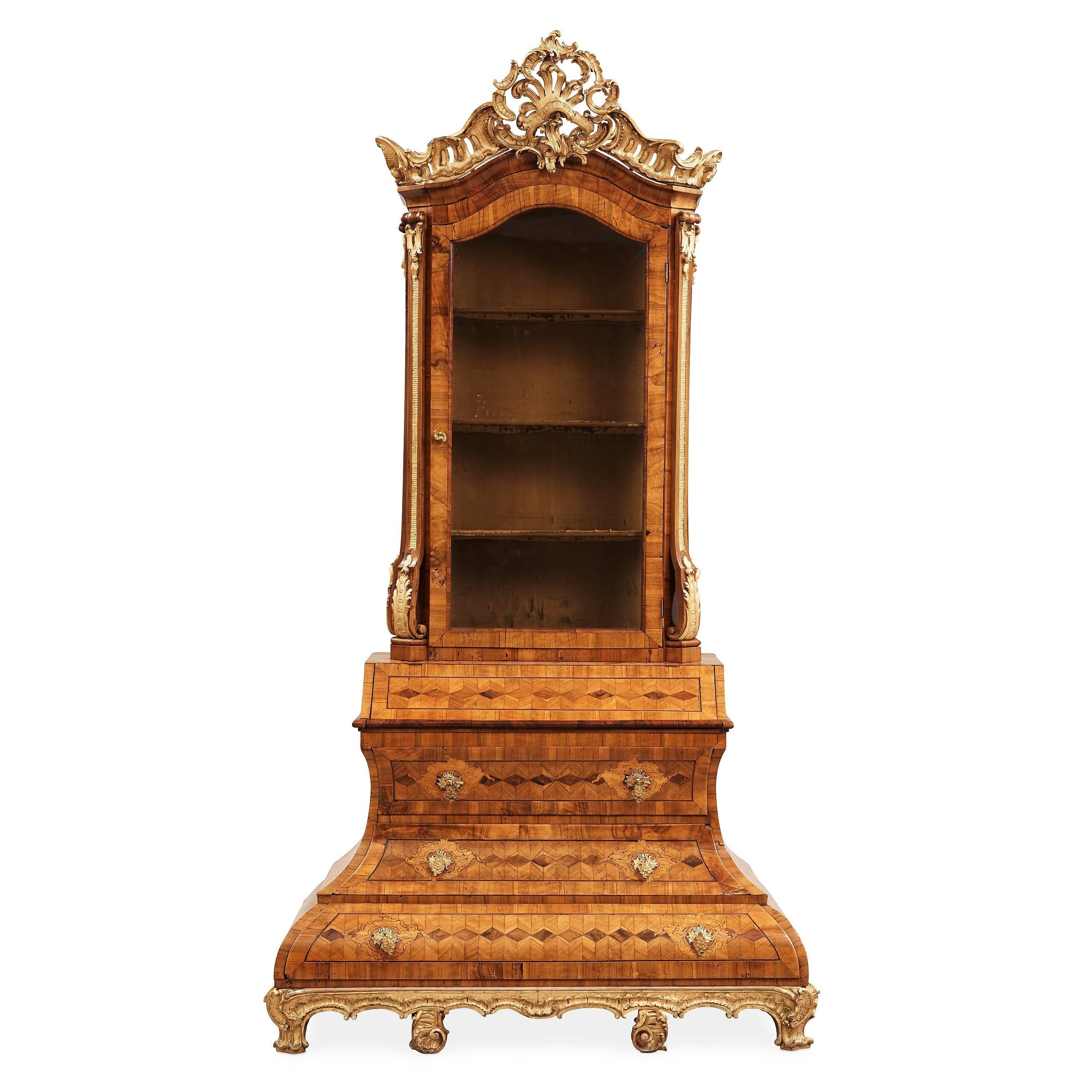A small German 18th century Rococo cabinet of an unusual model.