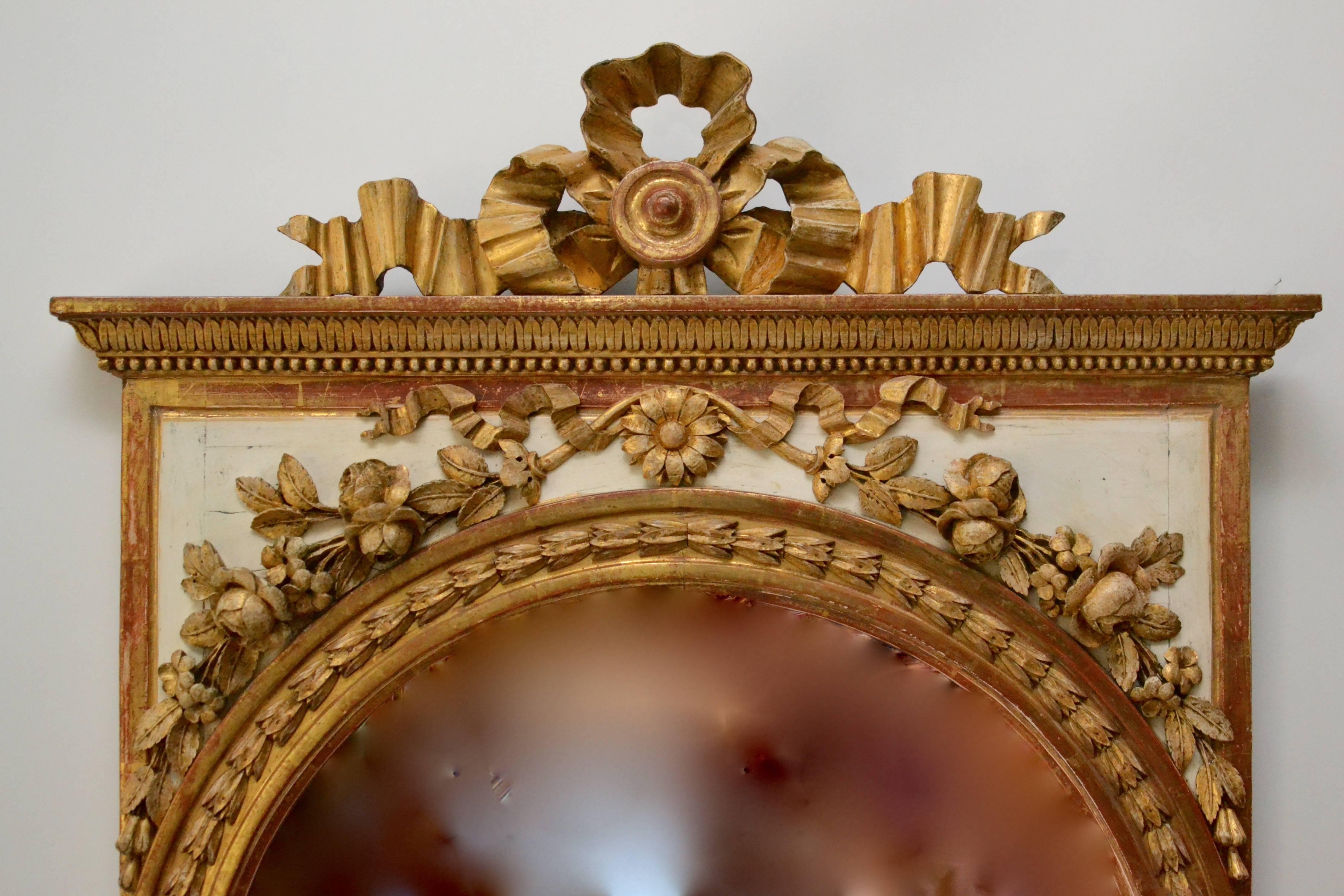 A very fine late Gustavian giltwood mirror by Per Ljung (1743-1819), Stockholm. Original gilding and glass, circa 1800. Per Ljung was one of the best of his time and had many royal commissions. He did much of the interior in the Haga