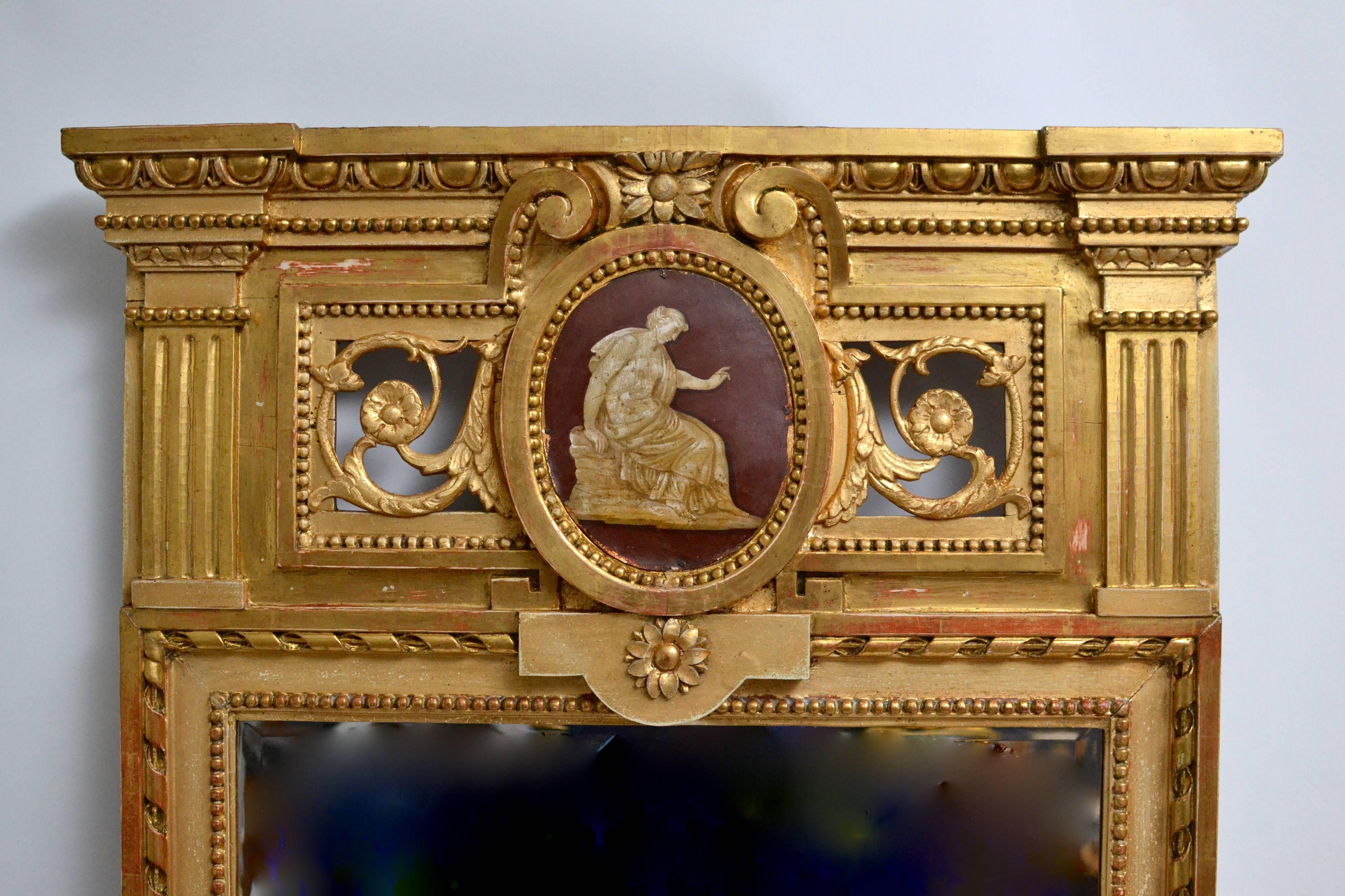 A fine carved giltwood mirror by Johan Åkerblad circa 1780-1790, Stockholm. The mirror has it´s original gilding and original glass. Åkerblad was one of the leading mirror makers of his time.