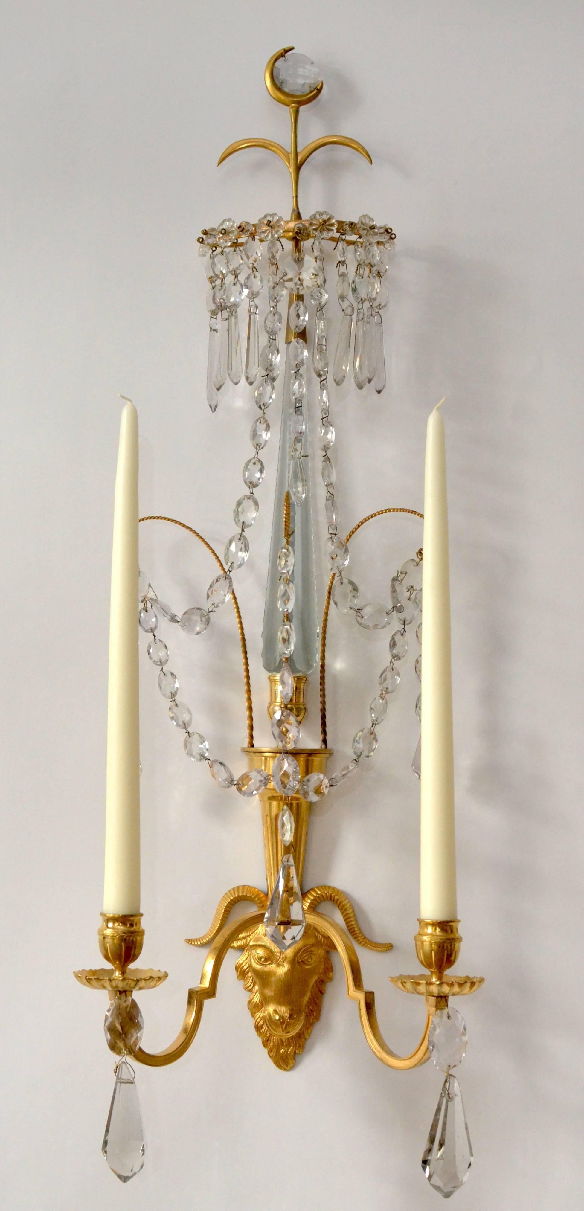 A pair of Swedish gilt bronze and crystal wall lights, late 18th century.