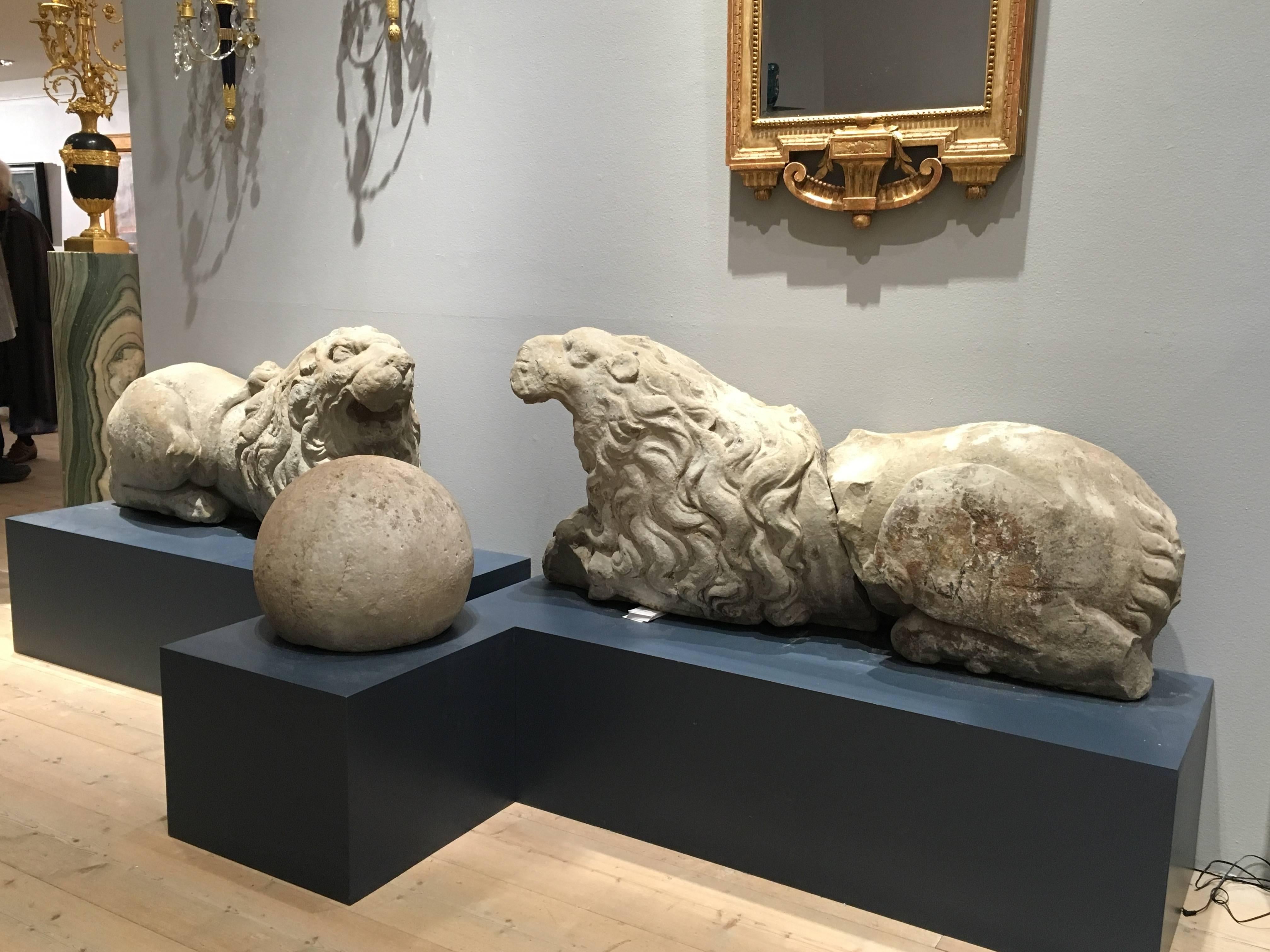 Pair of 17th Century Carved Sandstone Reclining Lions Originally Part of the 1