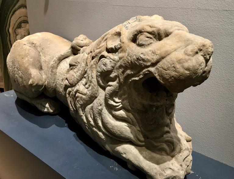 Pair of 17th Century Carved Sandstone Reclining Lions Originally Part of the 4