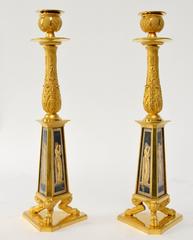 Rare Pair of Gilt-Bronze and Verre Églomisé Candlesticks, Early 19th Century