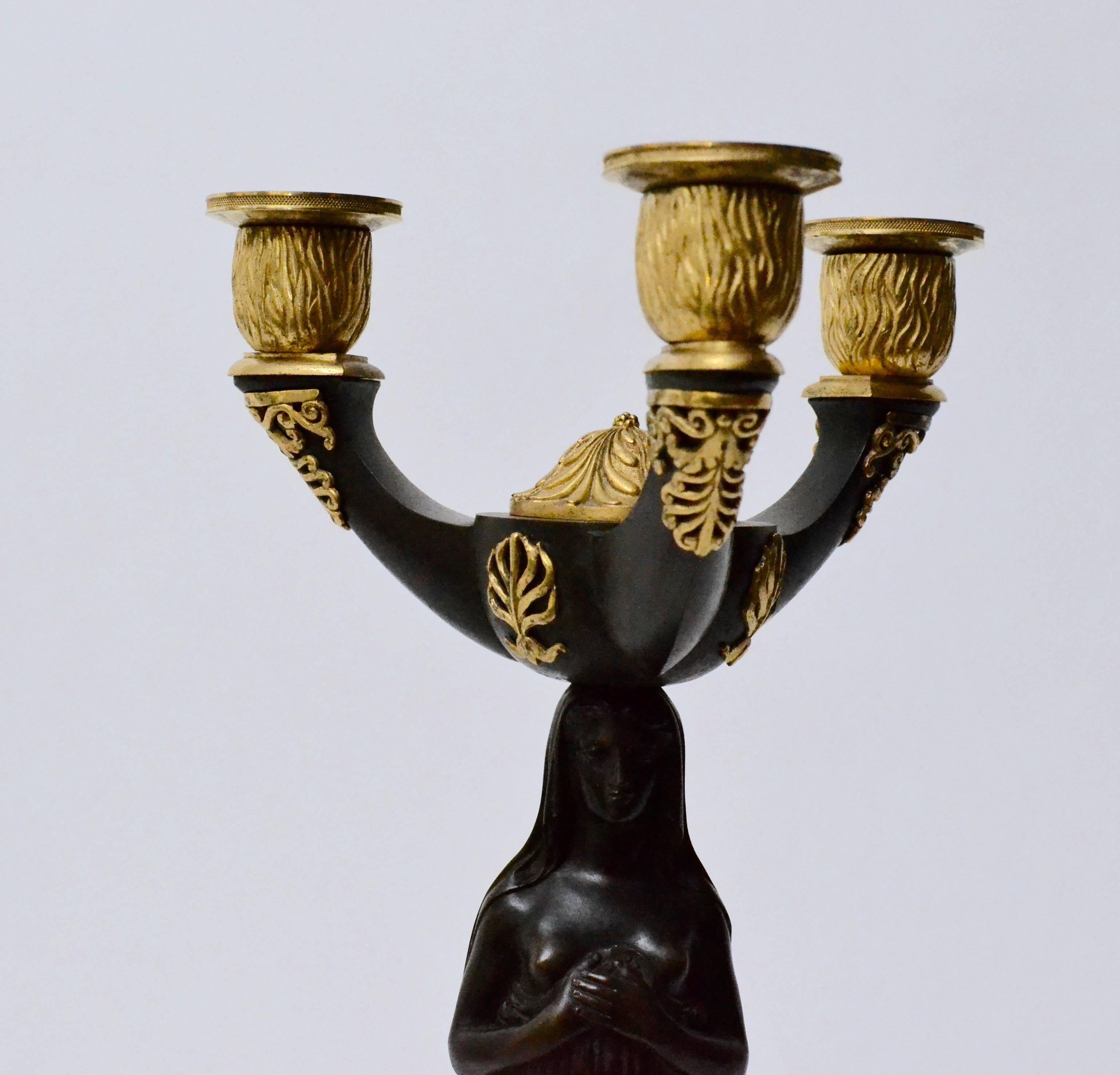 Pair of Gilt Bronze and Patinated Empire Candelabra In Good Condition In Stockholm, SE